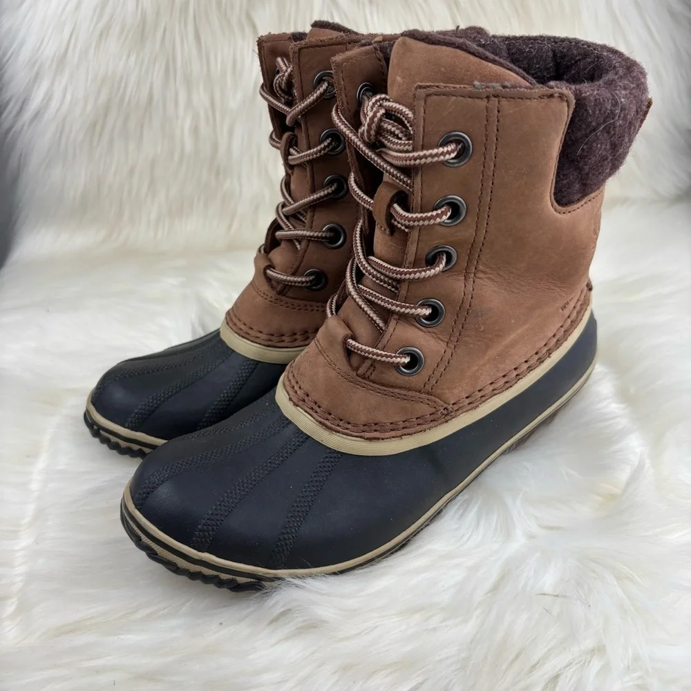 Sorel Tan and Black Lace-Up Boots
